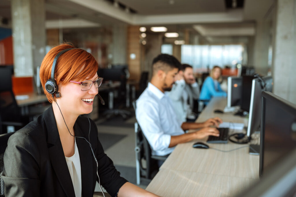 Team of business people working in a call centre on the line.